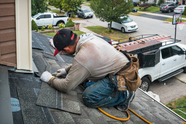 Professional Roofing technician working in Treadwell, NY